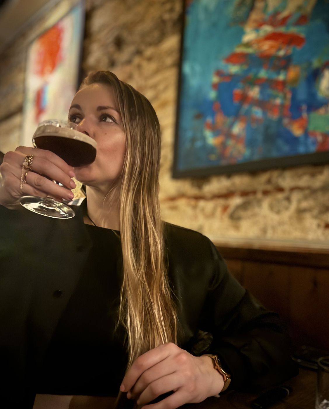 Berenice sipping an espresso martini